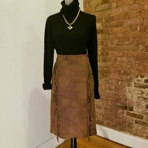 Context distressed brown fringe skirt